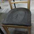 Someone drew Gandalf on this suede chair